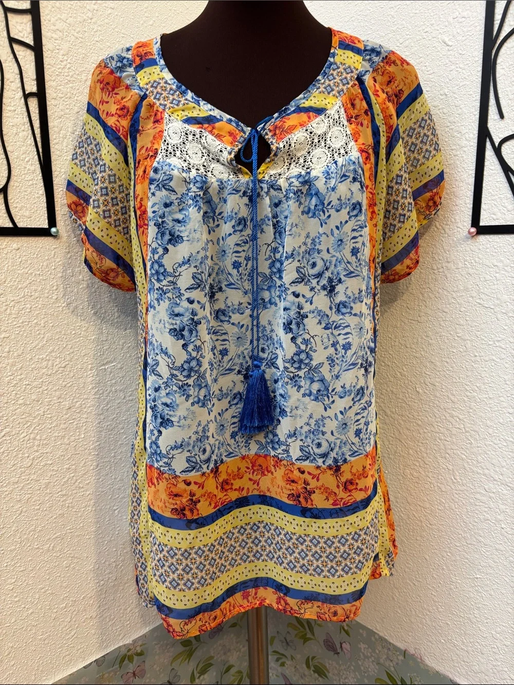 Fig & Flower blue, yellow & orange short sleeve semi-sheer top. Size M.